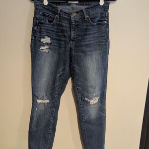 Distressed Blue Jeans